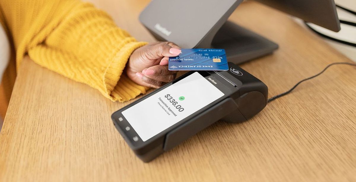 A mobile POS taking a credit card payment.